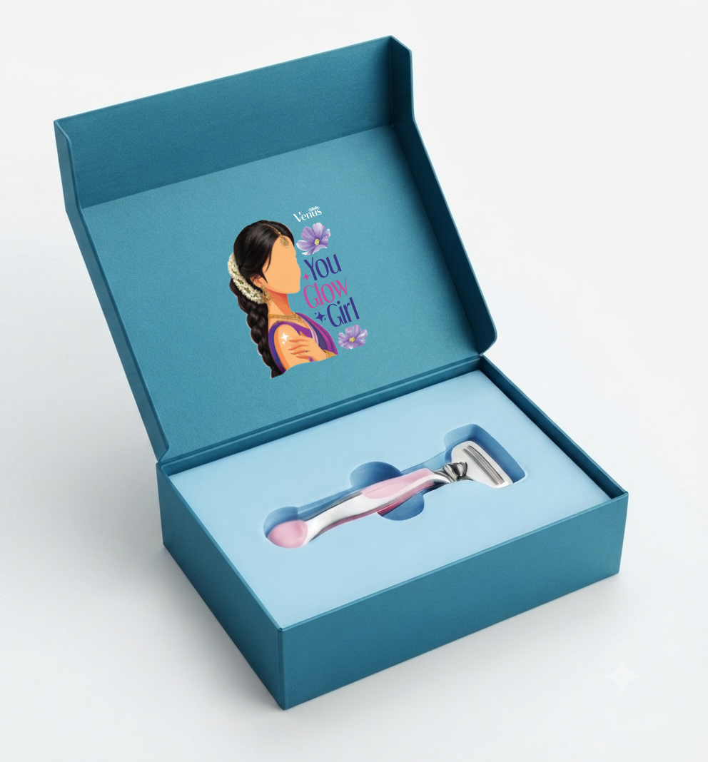Open Gillette Venus gift box with razor and You Glow Girl illustration